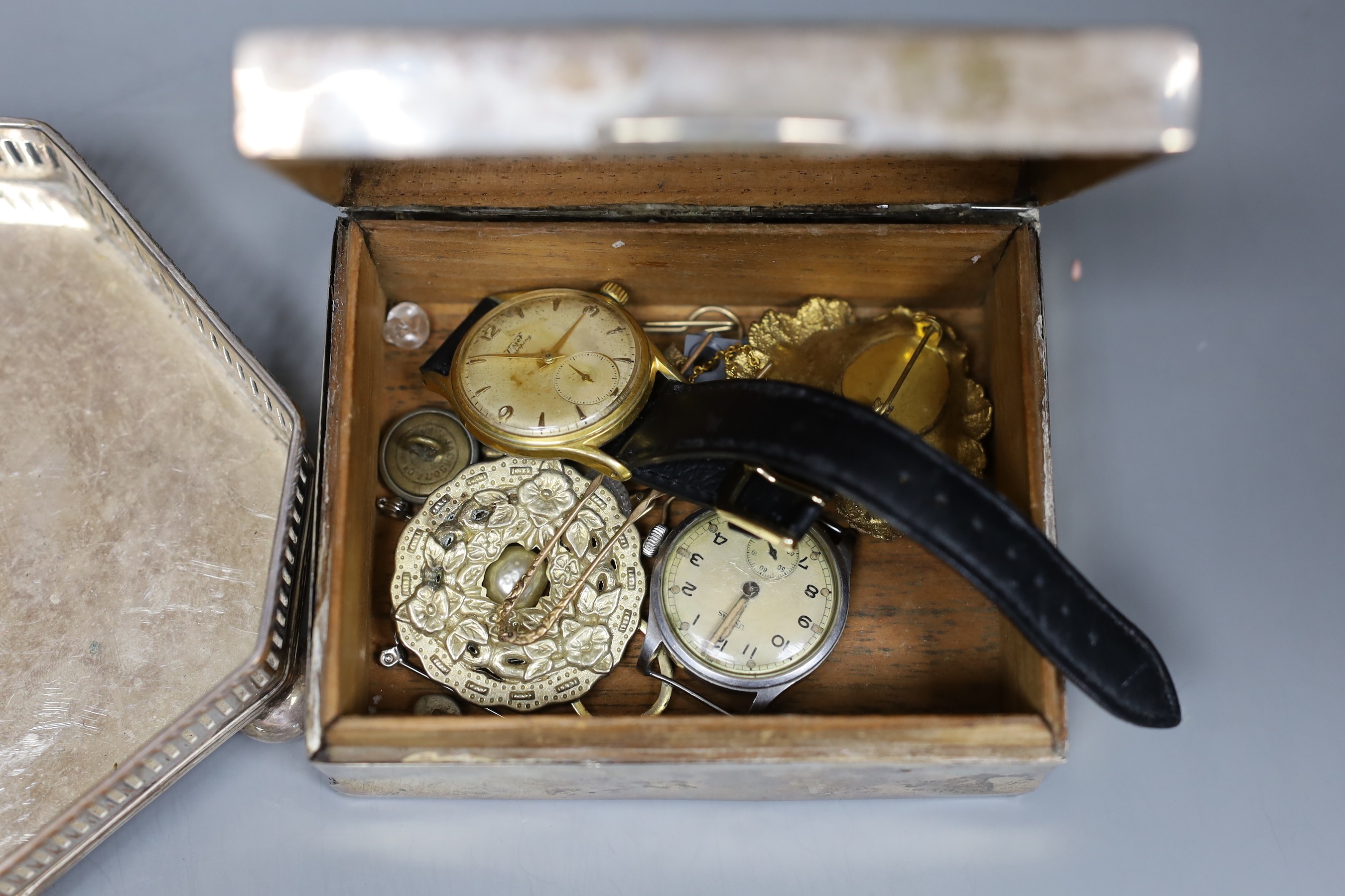 A silver cigarette box, sundry jewellery, a plated stand, etc.